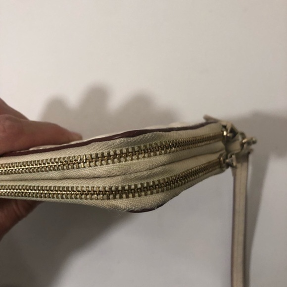 Coach debossed creamy white double zipper wristlet